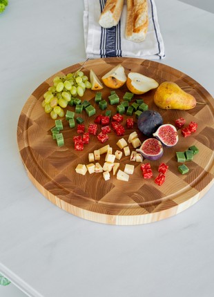 Round ash cutting board 45 cm3 photo