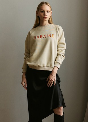 Embroidered sweatshirt 'UKRAINE' in beige1 photo