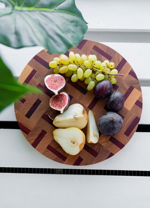 Round ash&sapeli cutting board 30 cm
