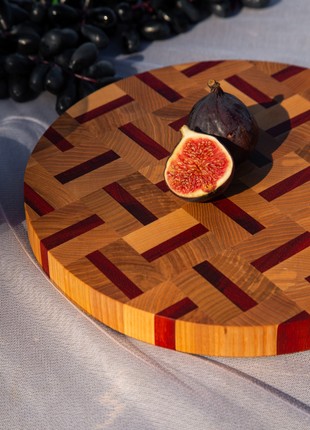 Round ash&sapeli cutting board 30 cm7 photo