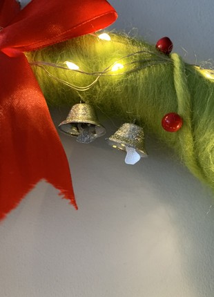 Wreath on the door with lighting decoration for the new year and Christmas8 photo