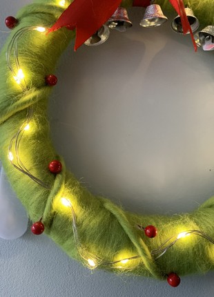 Wreath on the door with lighting decoration for the new year and Christmas5 photo