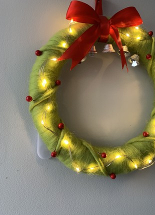 Wreath on the door with lighting decoration for the new year and Christmas7 photo