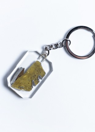 A keyring with a piece of a downed Russian Mi-244 photo