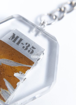 A keyring with a piece of downed Russian Mi-35 helicopter
