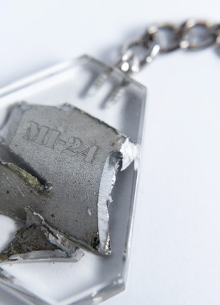 A keyring with the piece of a downed Russian Mi-24 helicopter