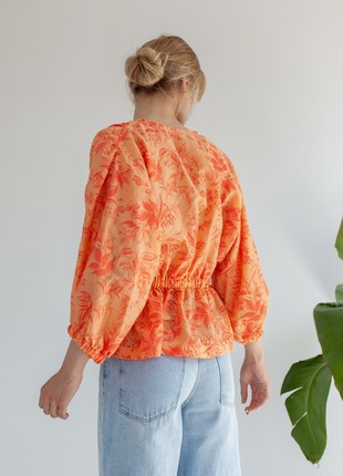 Orange blouse with floral print5 photo