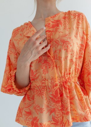 Orange blouse with floral print2 photo