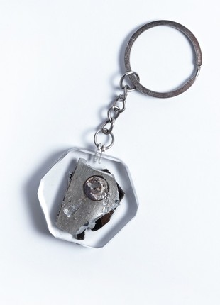 A keychain with a piece of taken down russian su-25 aircraft3 photo
