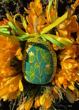 Small green easter egg with berries