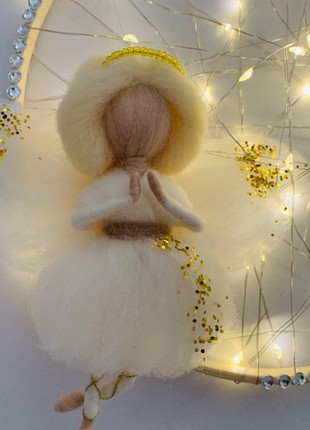 A lamp with a wooden base, an angel made of wool, a night light3 photo