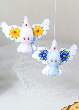 Doves of peace with Ukrainian symbols6 photo