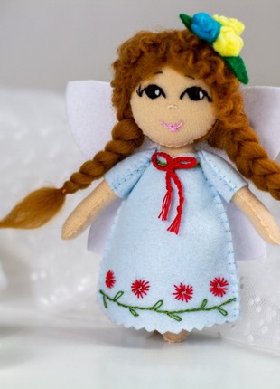 Ukrainian souvenir "Ukrainian girl in an embroidered dress" set of 32 photo