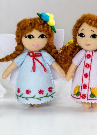 Ukrainian souvenir "Ukrainian girl in an embroidered dress" set of 38 photo