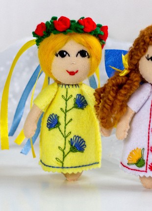 Ukrainian souvenir "Ukrainian girl in an embroidered dress" set of 310 photo