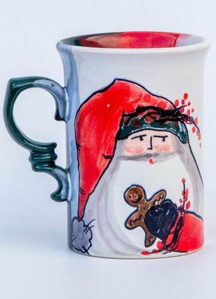 Christmas handmade ceramic mug Santa with a gingerbread man New Year 20231 photo