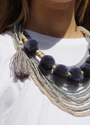 Gray beaded necklace with tassels