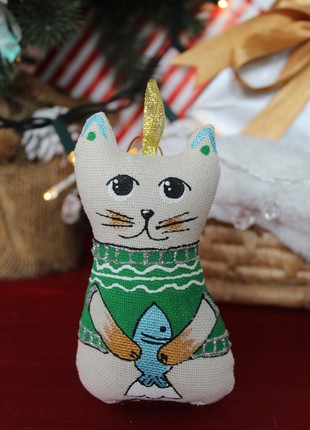 Cat in a green sweater