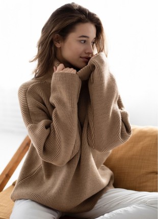 Warm woolen sweater of light brown color1 photo