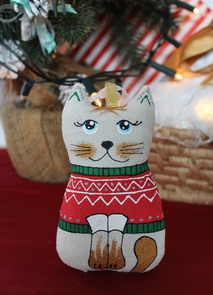 Cat in a red sweater1 photo