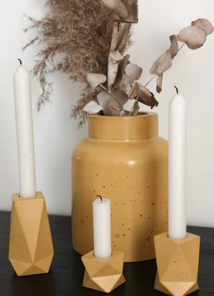 Set of concrete candle holders6 photo