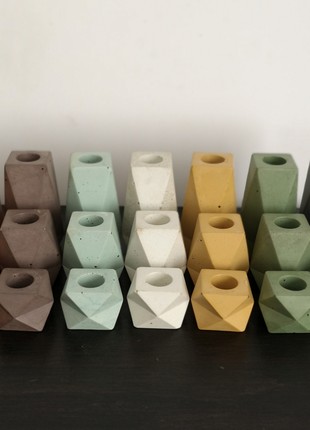 Set of concrete candle holders, in assortment1 photo