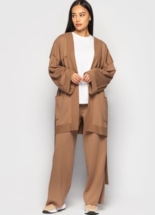 The suit with a cardigan and loose trousers is light brown4 photo