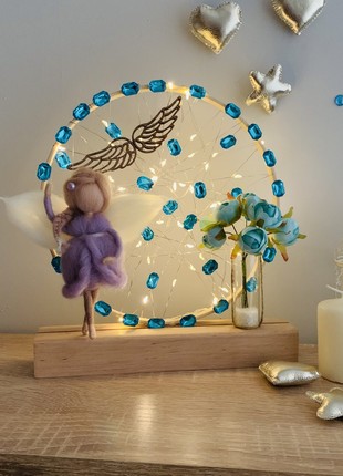 A lamp with a purple angel and blue flowers, room decoration, home lighting