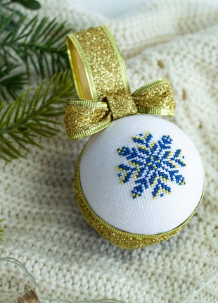 Christmas ball with Ukrainian ornament in blue-yellow color1 photo