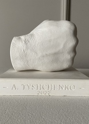 Plaster sculpture of a fist3 photo