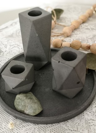Set of concrete candle holders6 photo