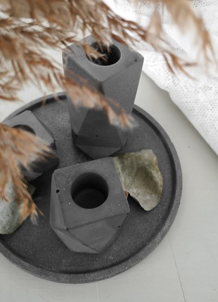 Set of concrete candle holders7 photo