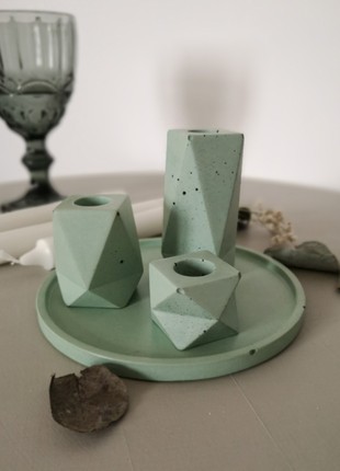 Set of concrete candle holders4 photo