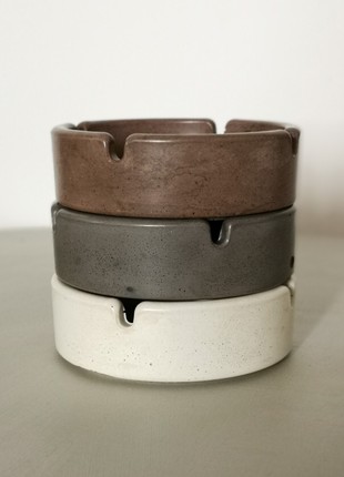 Round concrete ashtray