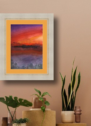 Watercolor drawing of a sunset over a lake. Nature painting