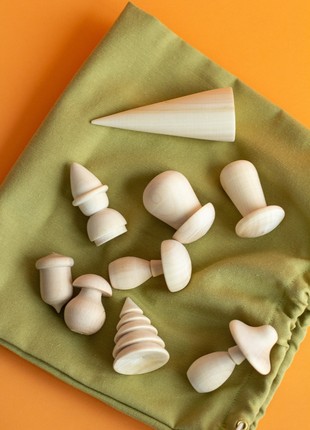 A set of wooden toys in a linen bag10 photo