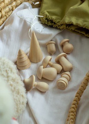 A set of wooden toys in a linen bag7 photo