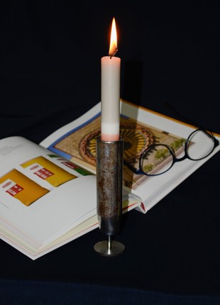Candlestick is made from a shell casing