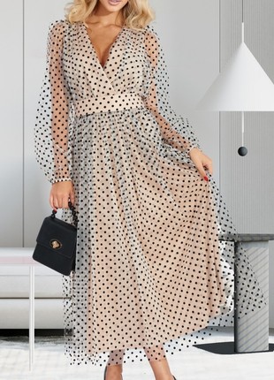 Elegant beige airy dress with black polka dots