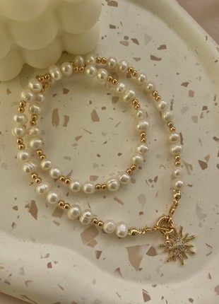 24k gold necklace with pearls and sun pendant