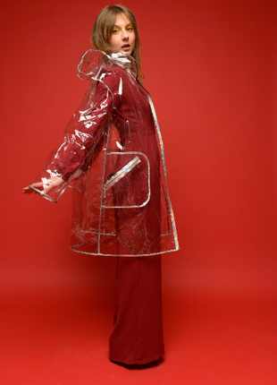 Transparent raincoat with silver edging, vinyl waterproof women's jacket