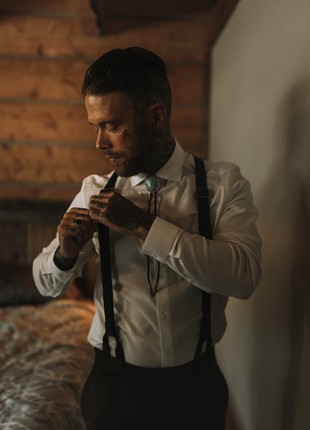 Leather suspenders on button3 photo