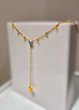 Minimalist choker with hearts on a chain.