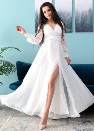 Evening shiny white floor-length dress
