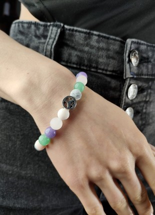 Bracelet with natural stones and charm "Peace"1 photo