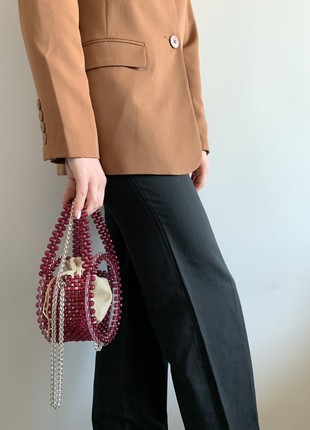 Transparent round bag with burgundy beads1 photo