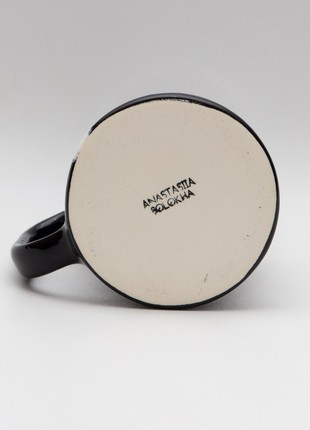 Handmade black ceramic mug with a white stripe3 photo