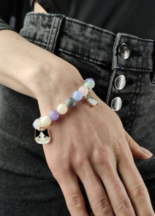 Bracelet with natural minerals and pendants "Kitty and bird"