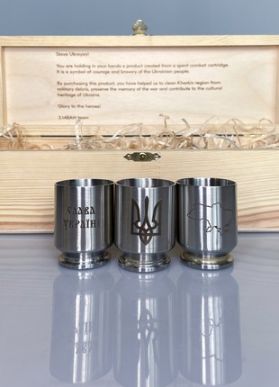 Shot glasses for alcohol made from a spent combat cartridge case