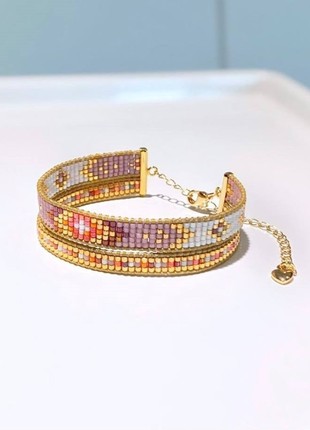 Double bracelet in pink and orange colors.